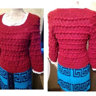 A photo of the knitted sweater. Color bordeaux. Sleeve's top view. Merino wool 100%. (SKU 1-9)