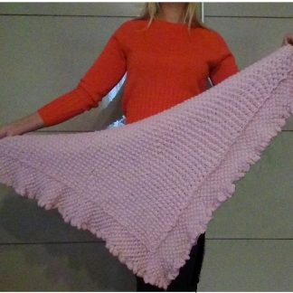 A photo of a handmade knitted shawl, Mohair, color pink, half folded, sku 1-1, Author- Tai Keri