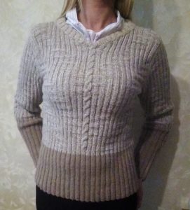 A photo of a handmade knitted sweater, color milk-and-coffee, pattern and model author- Tai Keri, sku 1-17, Wool