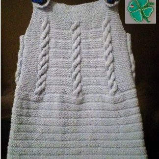 A photo of a handmade knitted pinafore dress for 2-3 years old girl. Front view. Merino wool 100%. (SKU 1-11)