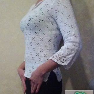 A photo of a handmade crochet blouse, sleeves with the ornaments. Cotton 100%, color white, sku 1-8, Author- Tai Keri
