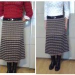 A photo of a handmade knitted midi skirt, grey black stripes, wool. SKU 2-10. Author- Tai Keri