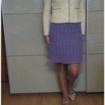 A photo of a handmade knitted jacket, color white, front view, pure wool. Author- Tai Keri, sku 2-7