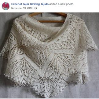 A photo of the 61st shawl, knitted