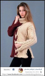 A photo of a 104th sweater, knitted
