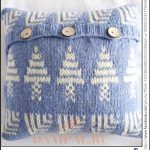A photo of a misc 131st, a cushion, knitted